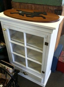 My daughter wants the pony wall plaque. I want the white cupboard for a standing desk area! Isn't it cute?
