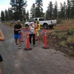 Fit2B Studio co-founders, Chris and Bethany, passing the baton at the Cascade Lakes Relay RacePartners