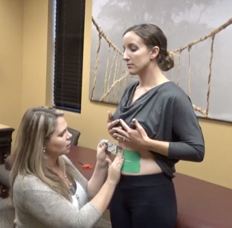 Taping Diastasis Recti: How to Use Kinesiology Tape on Separated Abs - Fit2B.com - Fit2B knows busy moms are wondering not only “Is splinting my abs a good idea for my diastasis recti?” but also, “Would kinesiology taping help me during my postpartum workouts?” Click through as we discuss this and free videos to help you find what work will work for you at your stage of postpartum recovery. #diastasis #diastasisrecti #fit2b #busymoms #postpartum