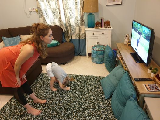 Fit2B member and her toddler working out at home with our "5-Minute Yoga In A Field In A Dress" routine - fit2b.com